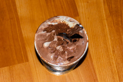 High angle view of coffee in glass on table