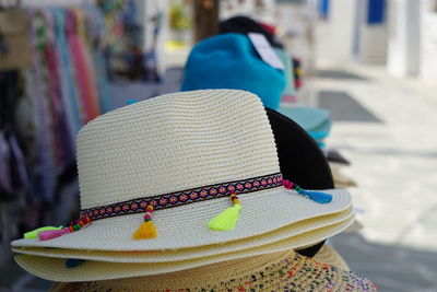 Colorful hats for sale at market stall