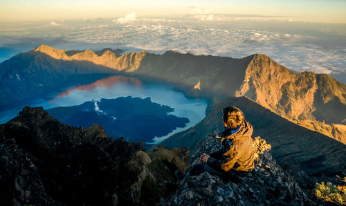 Scenic view of mountains and sea against sky