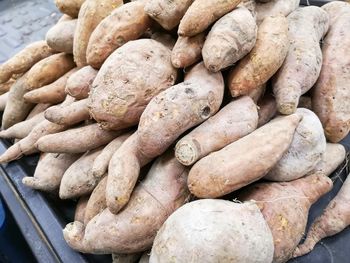 High angle view of carrots for sale at market stall