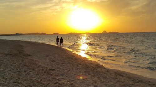 Scenic view of sunset over sea