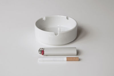 Close-up of lamp over white background