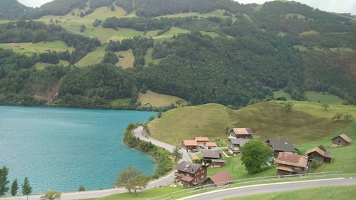 High angle view of houses by river