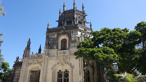 Low angle view of cathedral against clear blue sky