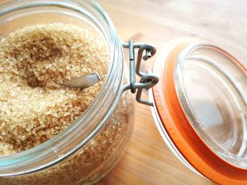 High angle view of brown sugar in jar on table