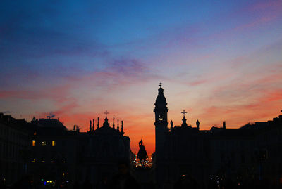 Silhouette church at piazza san carlo during sunset