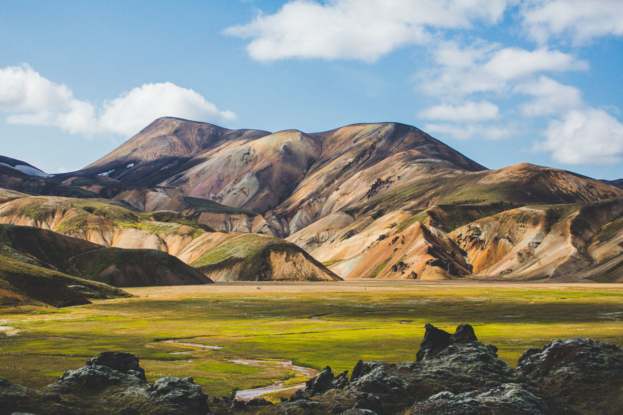 sky, cloud - sky, mountain, scenics - nature, beauty in nature, environment, landscape, tranquil scene, nature, tranquility, mountain range, non-urban scene, rock, day, solid, rock - object, no people, land, idyllic, outdoors, mountain peak, formation