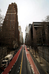 Panoramic view of road amidst buildings in city