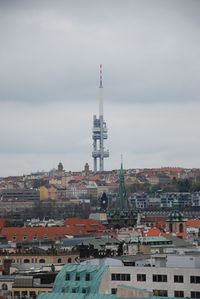 Buildings in city against sky