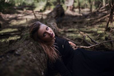 Young woman in forest