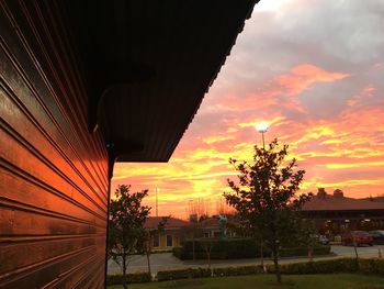 Built structure against sky at sunset