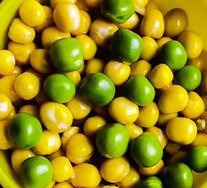 Full frame shot of green and yellow peas