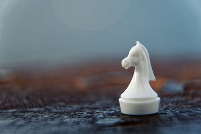 Close-up of chess piece on table