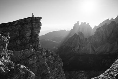 Man on mountain against sky