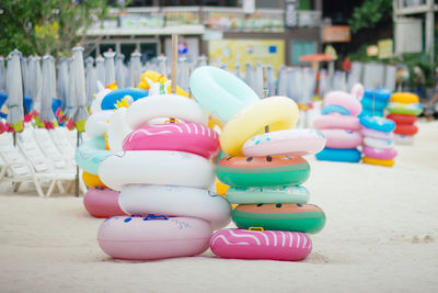 Inflatable rings stacked at beach