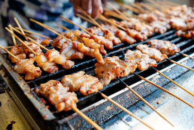 Close-up of meat on barbecue grill