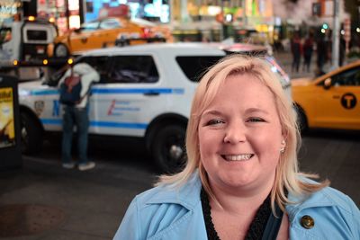 Portrait of smiling girl in car