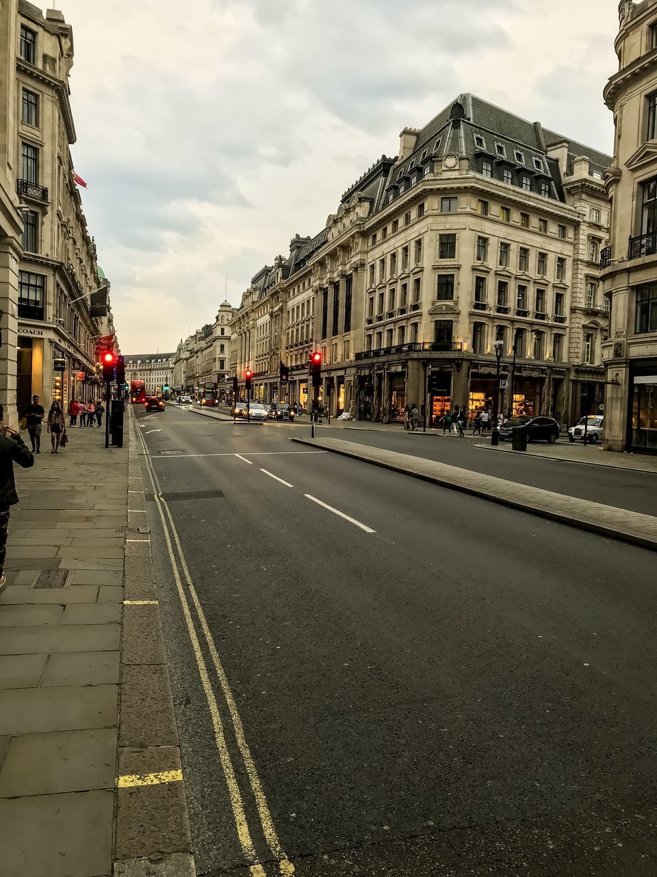 SURFACE LEVEL OF ROAD BY BUILDING AGAINST SKY