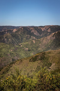 Scenic view of mountains against clear sky