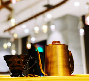 Close-up of coffee cup on table