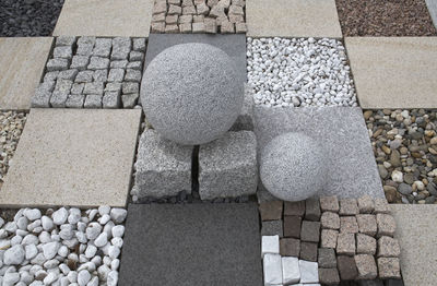 High angle view of stones in pebbles