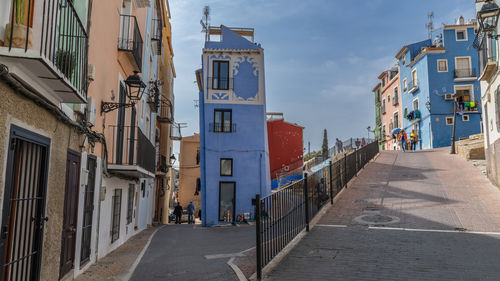 Canal amidst buildings in city