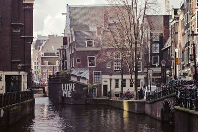 View of canal in city