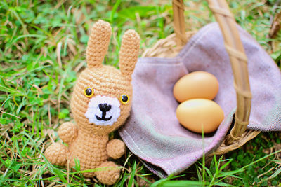 High angle view of stuffed toy on field