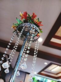 Close-up of flower vase on table at home