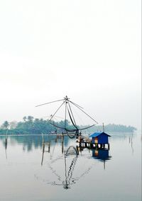 View of boats in calm lake