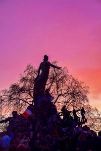 Low angle view of woman against sky