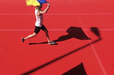 Low section of woman jumping