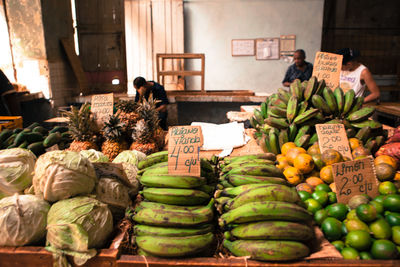 Vegetables and fruits for sale at market stall