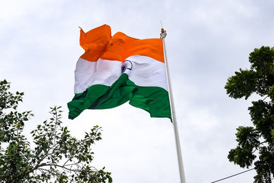 India flag flying high at connaught place with pride in blue sky, india flag fluttering, indian flag