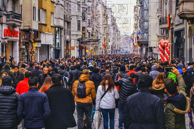 People walking on street in city