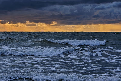 Scenic view of sea against sky during sunset