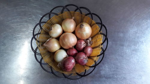 High angle view of fruits in basket on table