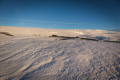 Scenic view of snow covered landscape