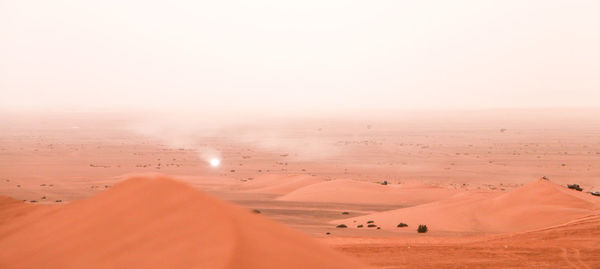 Scenic view of desert against clear sky