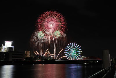 Firework display at night