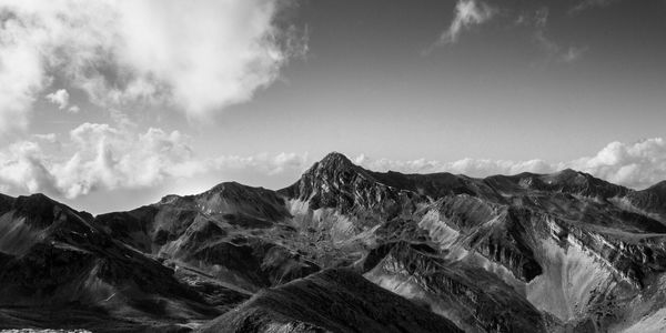 View of mountain range against sky