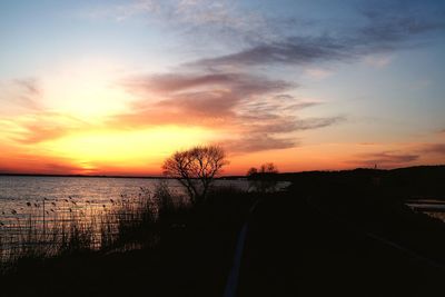 Scenic view of silhouette landscape against sky during sunset