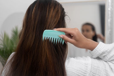 Rear view of woman with blond hair