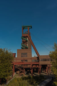 Old building against clear blue sky