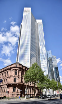 Low angle view of modern buildings against sky