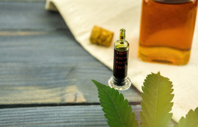 High angle view of bottles on table