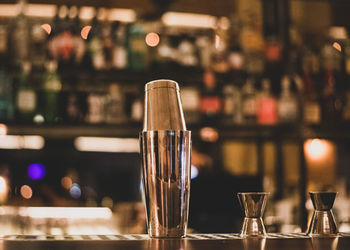 Close-up of beer glass on table