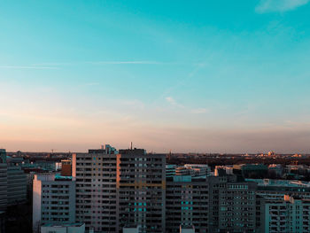 High angle view of buildings against sky during sunset