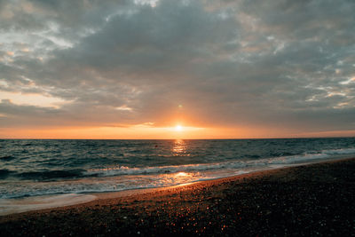 Scenic view of sea against sky during sunset