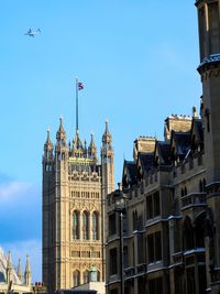 Low angle view of building against blue sky